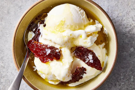 olive oil on ice cream in a bowl